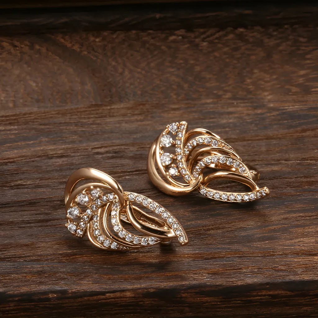 Women's gold-plated copper clip earrings with geometric wings design and zircon inlay in H0195 colour