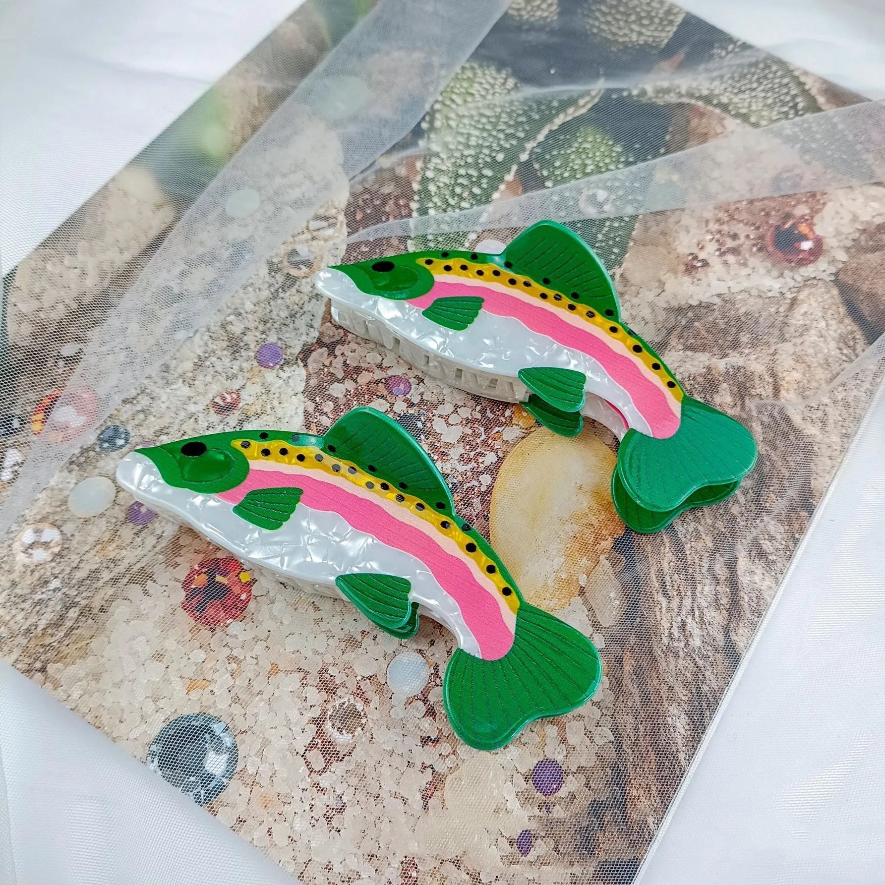Dark green PVC hair clip with rainbow trout design and carp decorative elements