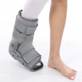 Grey and black Achilles tendon rehabilitation walking boot with adjustable straps