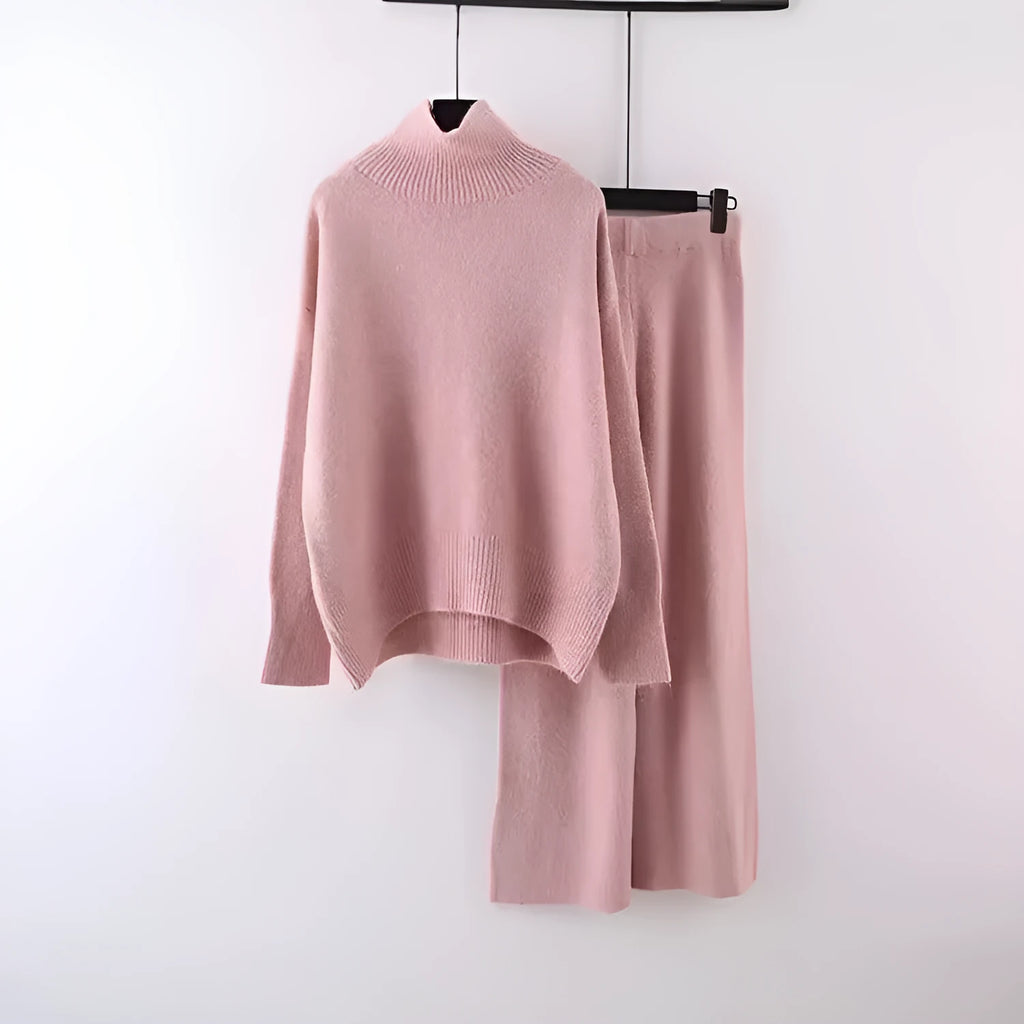 Women's milky white acrylic fibre sweater and wide-leg trousers two-piece casual set on a hanger.