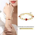 Sterling silver double-layer bracelet with white freshwater pearls and cinnabar red bean geometric design
