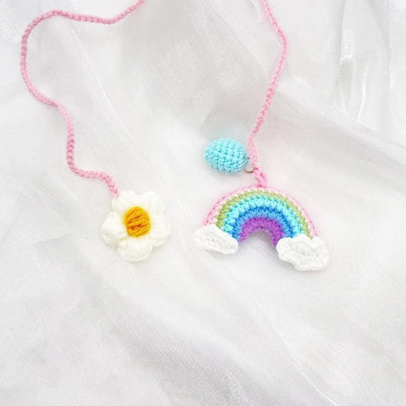 Handmade crocheted avocado rainbow flower car pendant made from wool yarn.