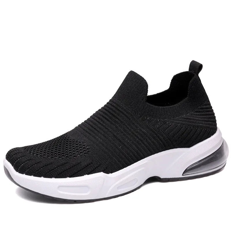 Breathable slip-on sock shoes in black, pink, khaki, and white colours with mesh lining and PVC sole.