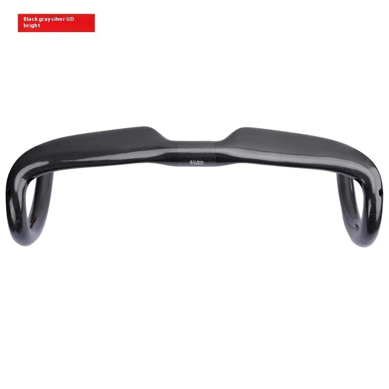 Carbon fibre road bicycle drop handlebars in black grey silver, showing UD weave pattern.
