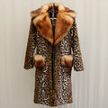 Women's long leopard print faux fur jacket with regular sleeves on a hanger