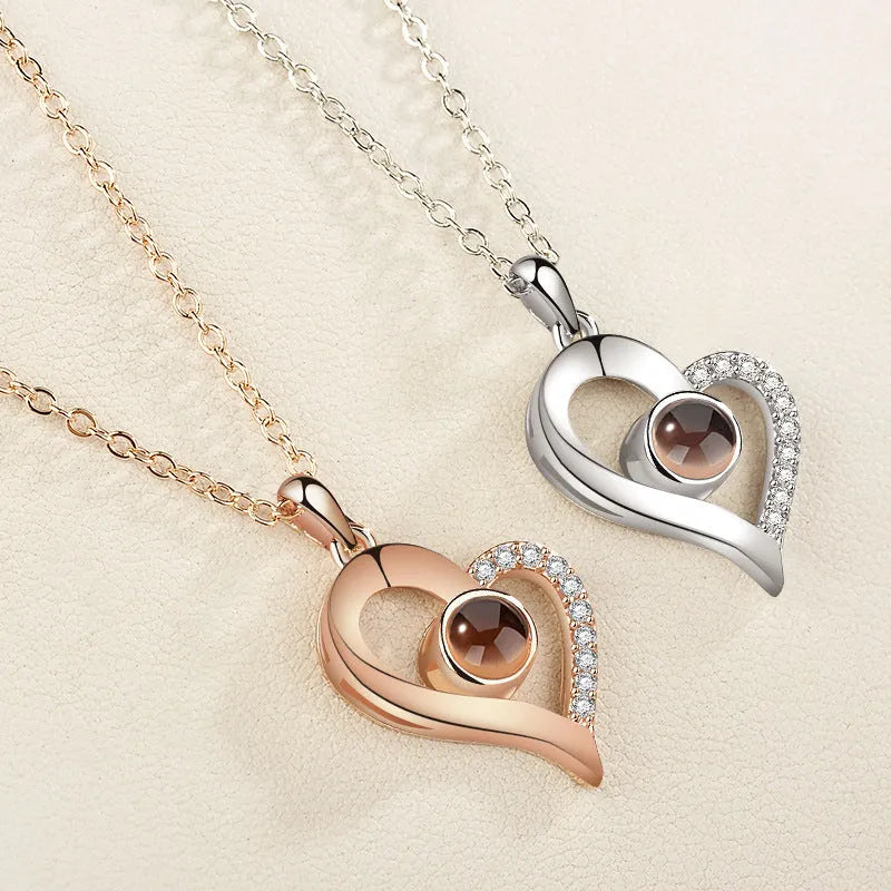 I love you 100 languages projection necklace, copper with gold plating, 50cm chain, pendant detail