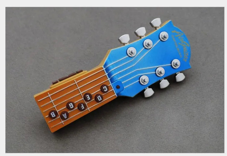Infrared air guitar with seven chord buttons and tilt sensor in red, 21cm long