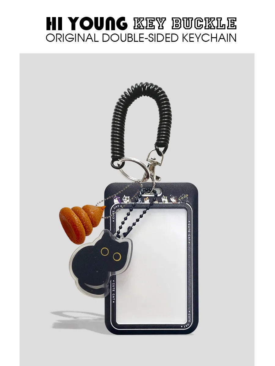 Plastic card holder with little black cat cartoon design and a metal ferrule pendant for attachment.