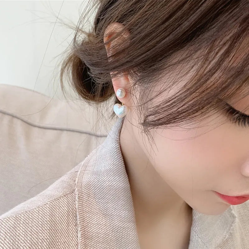 Women's heart-shaped pearl stud earrings with electroplated alloy construction and artificial gemstone details