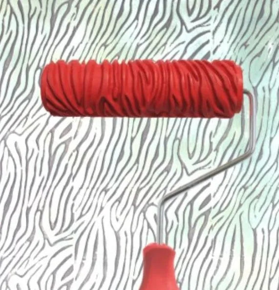 Red rubber paint embossing roller for creating textured wall patterns with standard paints
