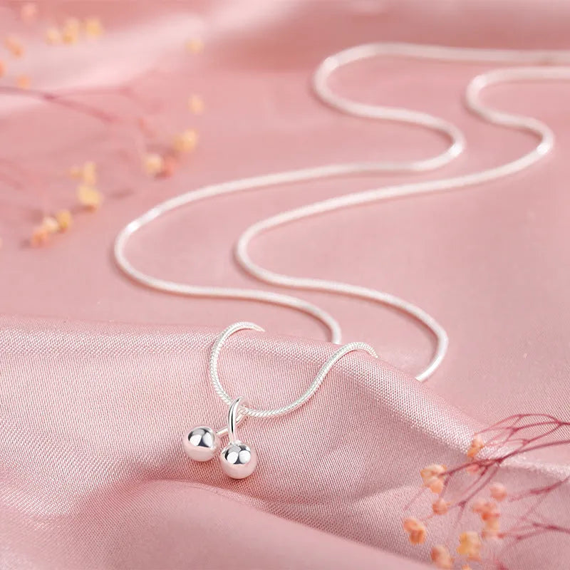 925 silver cherry fruit pendant on a snake bone chain necklace, adjustable from 21 to 50 cm.