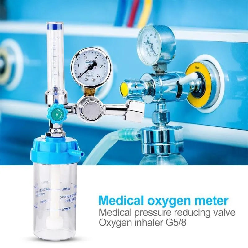 Blue oxygen cylinder pressure reducer accessory with dial and connection fitting for gas flow regulation.