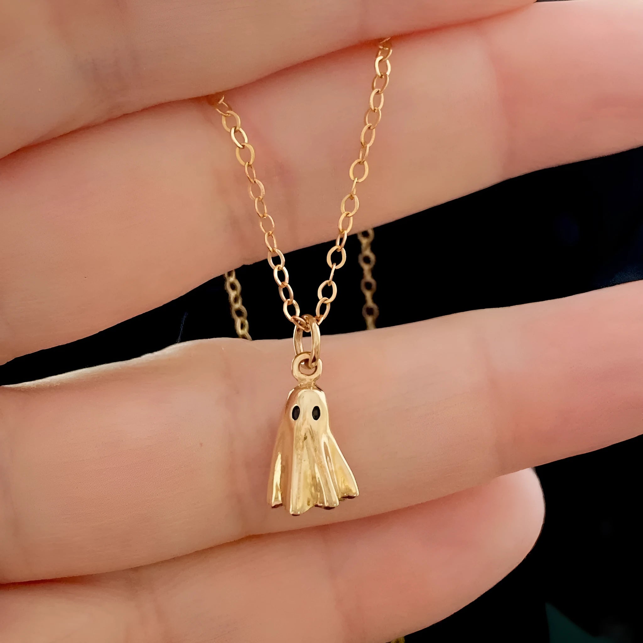Ghost motif pendant necklace on a twisted stainless steel chain, available in Cable, Figaro, or Mini Staple chain styles.