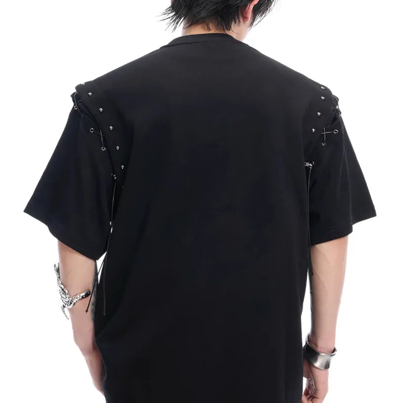 Black deconstruction lace-up cutout short sleeve t-shirt on a hanger