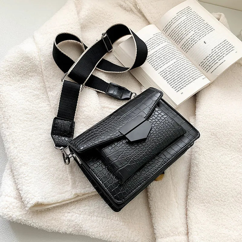 Vintage PU leather crossbody bag in black, shown with dimensions 20cm wide by 14cm high