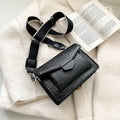 Vintage PU leather crossbody bag in black, shown with dimensions 20cm wide by 14cm high