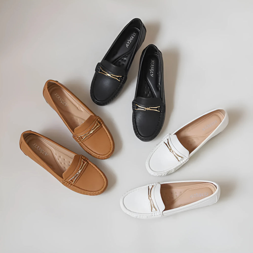 Gommino style men's slip-on shoes with height increasing insoles in black, white, and brown colour options
