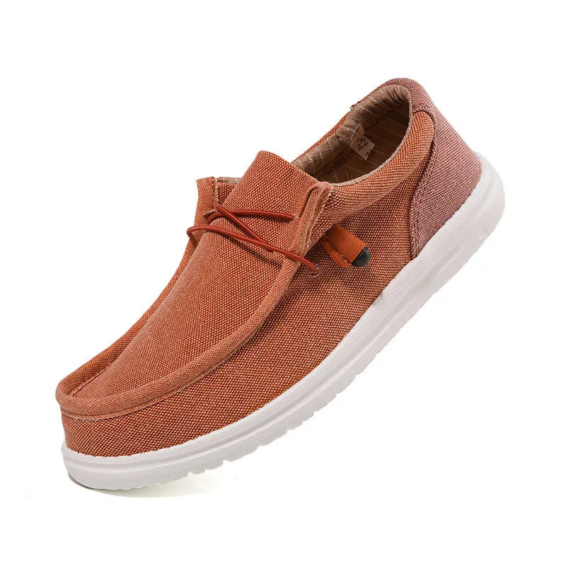 Men's orange and green canvas casual trainers with rubber soles and mosaic design details