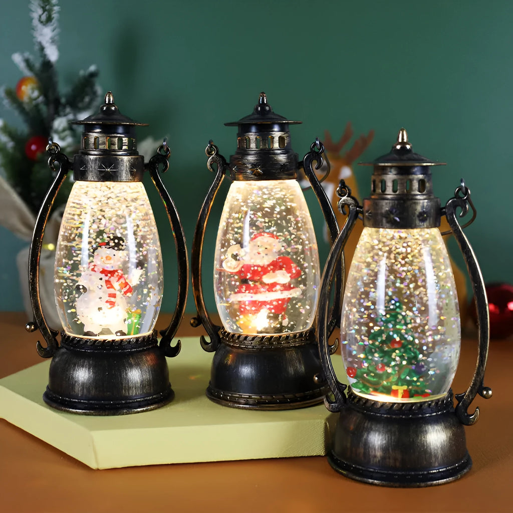 Portable crystal ball oil lamp Christmas decoration on a desktop, showing snowman and elderly figure options.