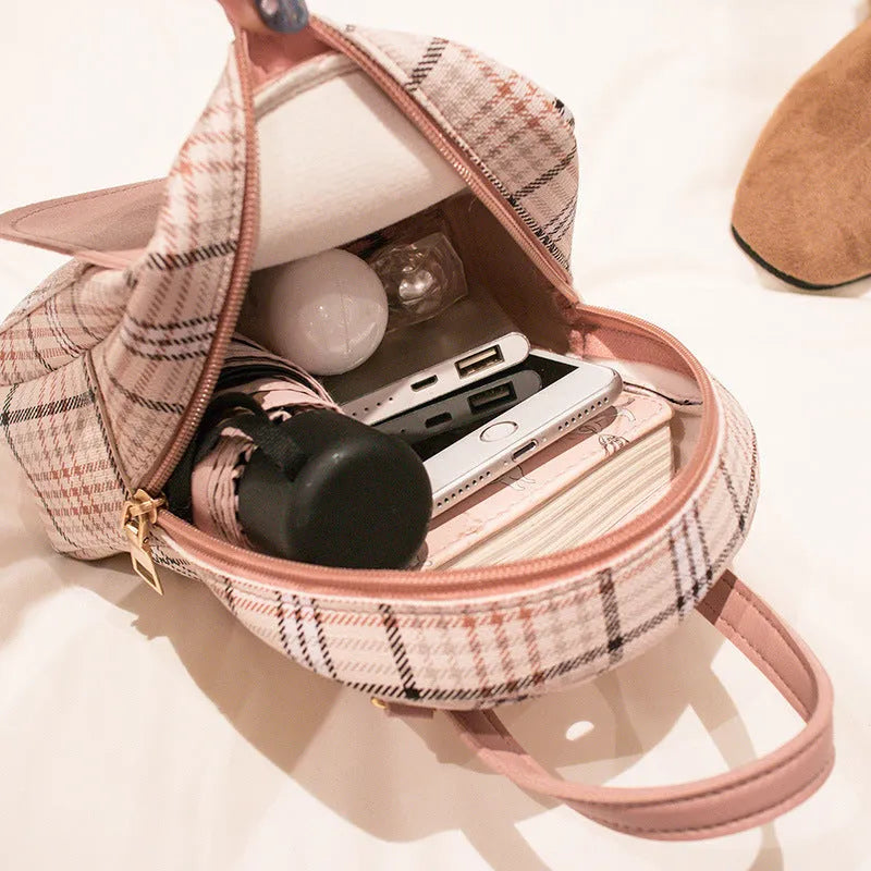 A one shoulder diagonal phone bag in PU material, shown in one of five colour options.