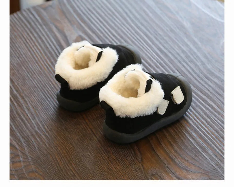Children's velvet toddler shoes in various colours, showing non-slip sole and soft upper.