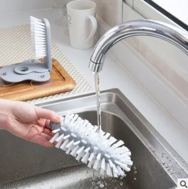 Grey double-head rotating cup brush with suction cups for wall mounting, length 17.5cm.