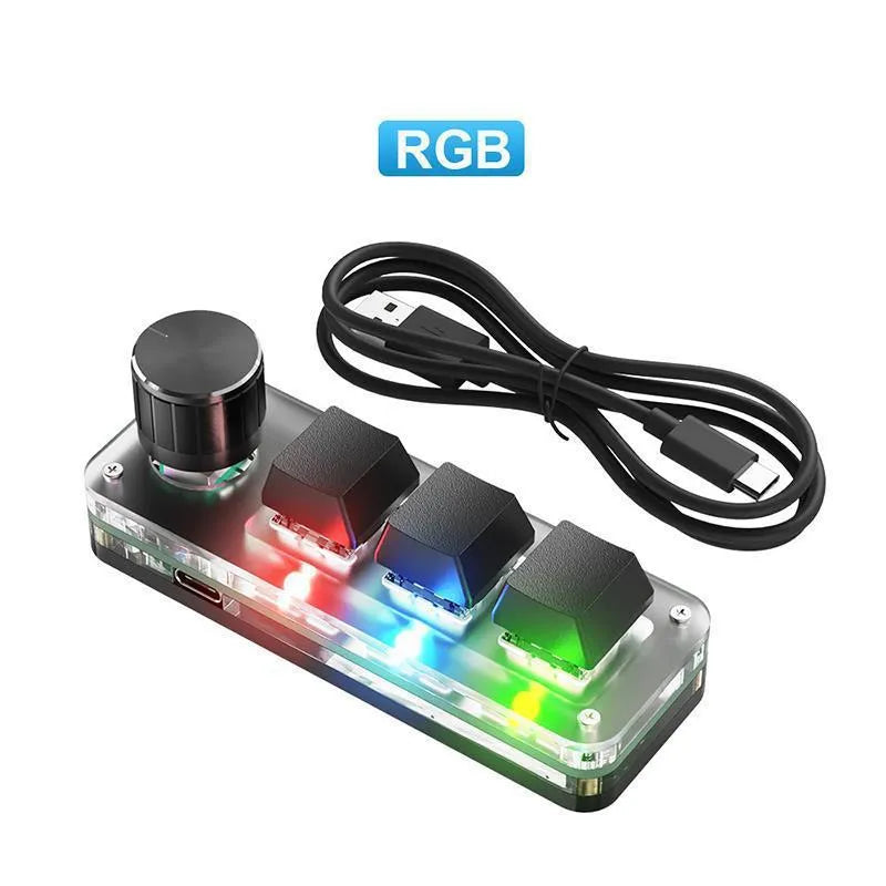 Custom black and white mini keyboard with RGB backlight and copy paste keys.