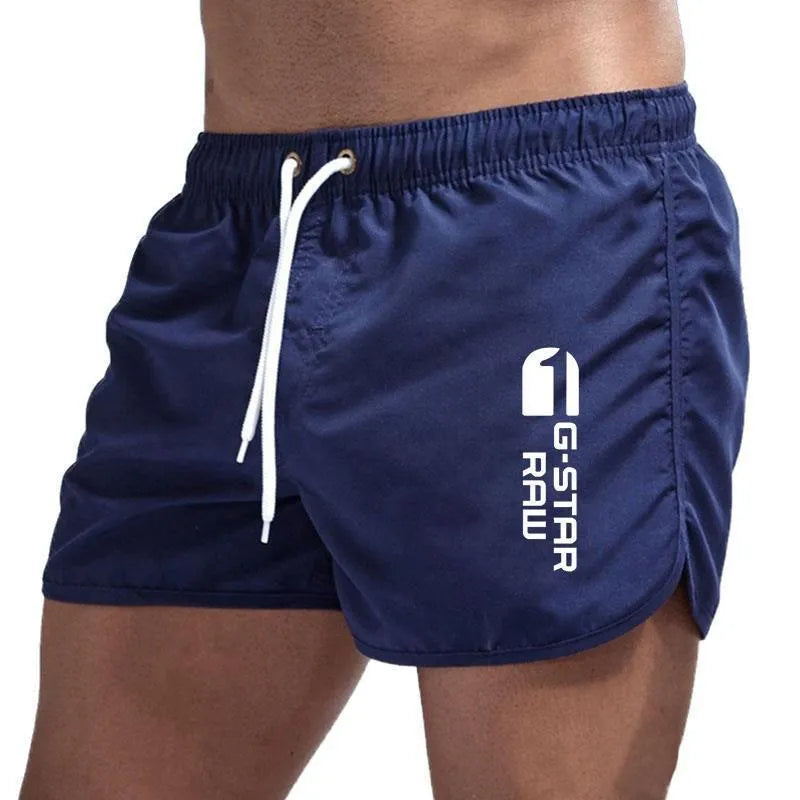 Man wearing lightweight polyester hemp-blended sports shorts in a vibrant colour with a micro-elastic waistband.