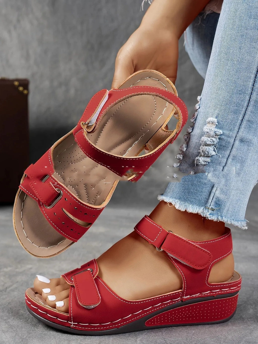 Women's thick bottom strap sandals with Velcro fastening in beige colour showing round toe and composite sole
