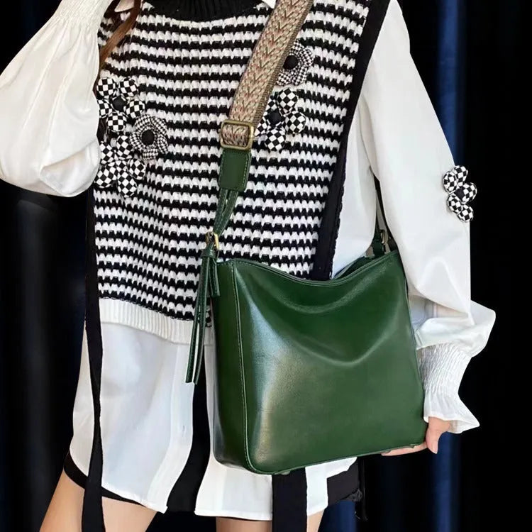 Women's genuine leather messenger bag in square vertical design with shoulder strap