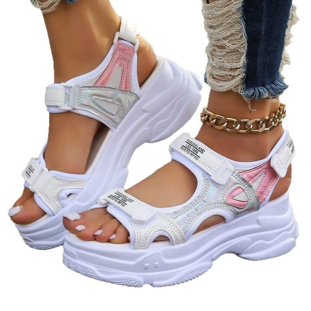Women's black Roman platform sandals with adjustable straps and rubber soles