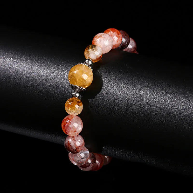 Handmade women's crystal bracelet with 10mm red sealant flower citrine lucky beads.