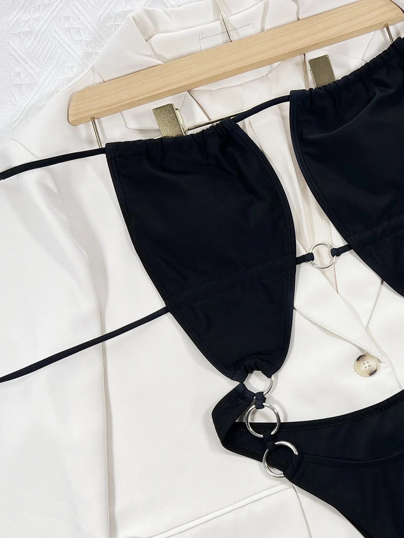 Black solid colour women's one-piece swimsuit with sleeveless design