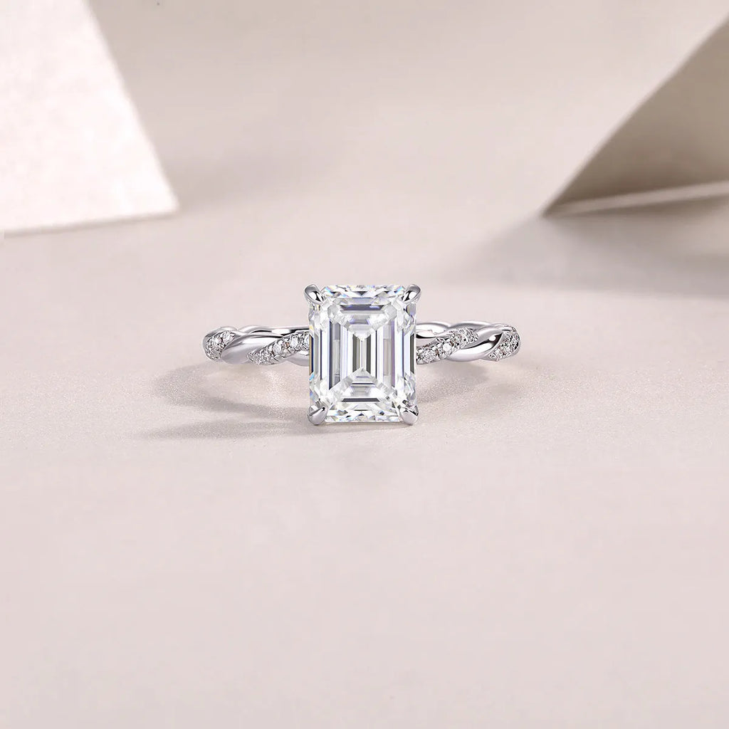 Octagonal moissanite wedding ring set in S925 silver with platinum plating, 7x9mm stone, sizes 5-9, gift box and GRA certificate.