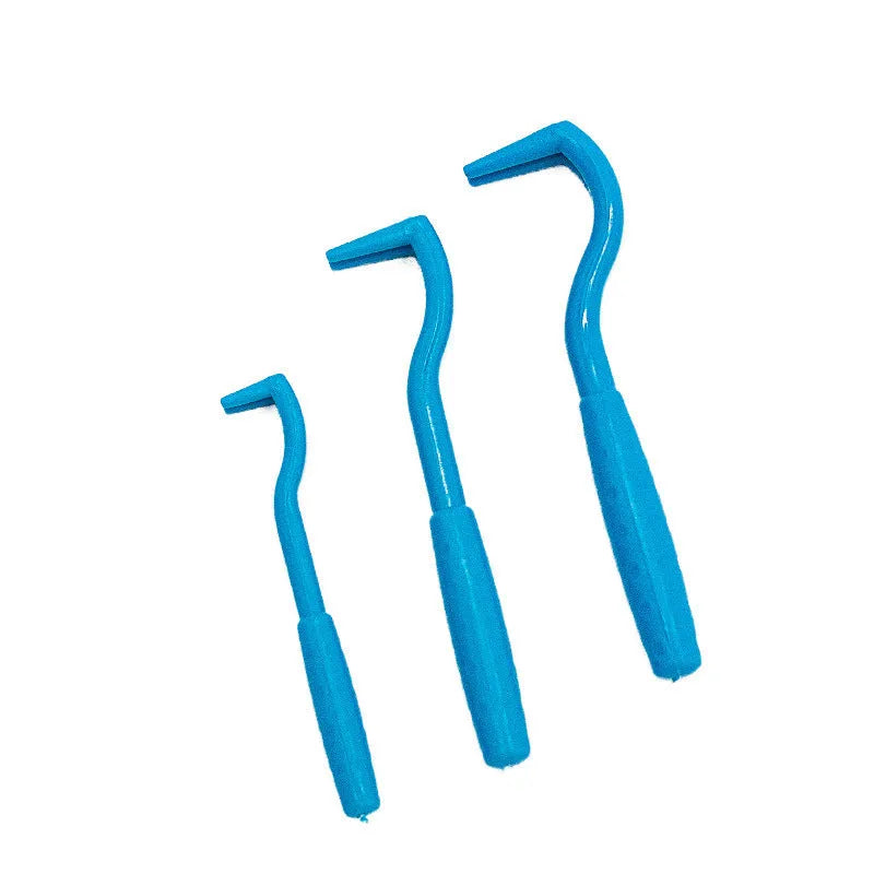 Three plastic tick removal hook tools for pets in blue and green colours