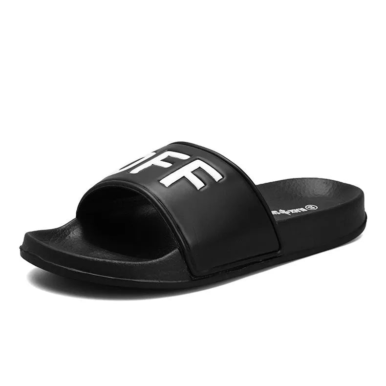 Large black and white open-toe men's slippers with a rubber sole, showing size range 36 to 46.