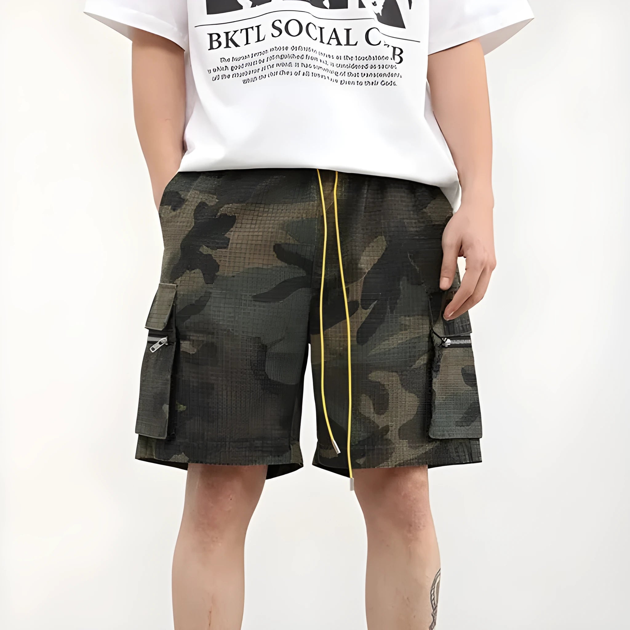 Men's camouflage cargo shorts showing multiple pockets and cropped leg length