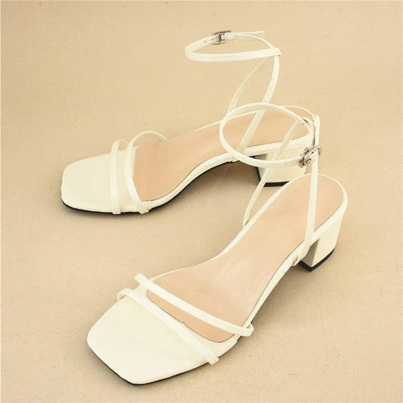 Beige women's square-toe sandals with a stiletto chunky heel and ankle buckle.