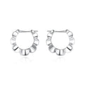 Sterling silver geometric earrings with round retro design elements