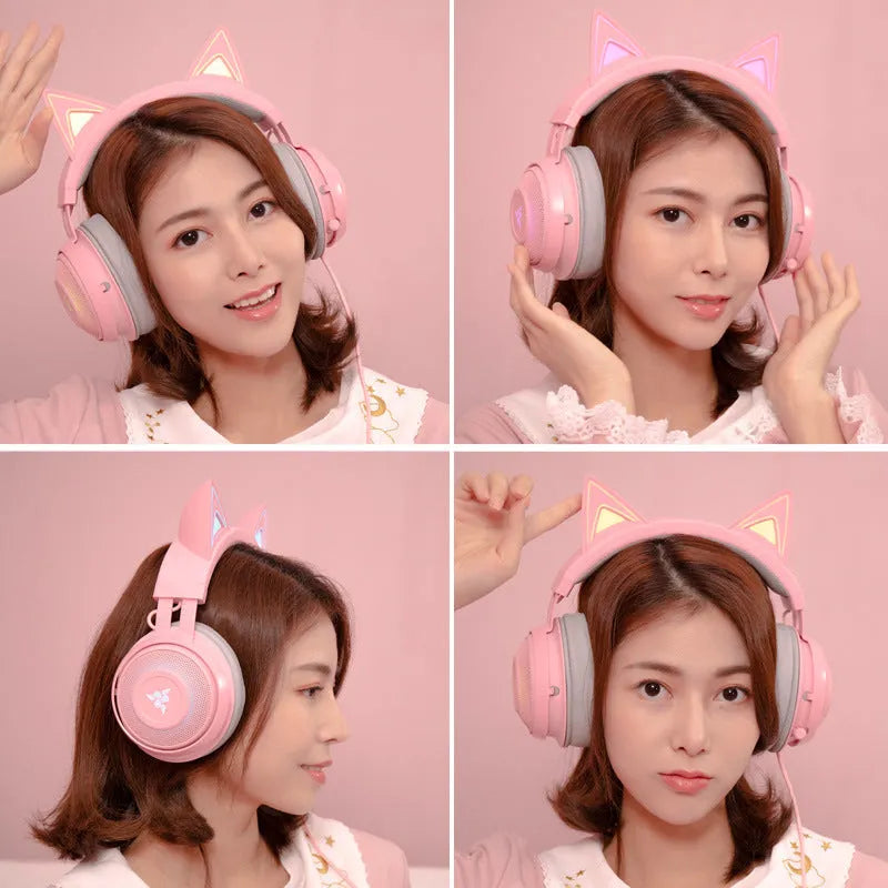 Pink wired USB cat ear headphones with glowing LED lighting on a head-mounted design