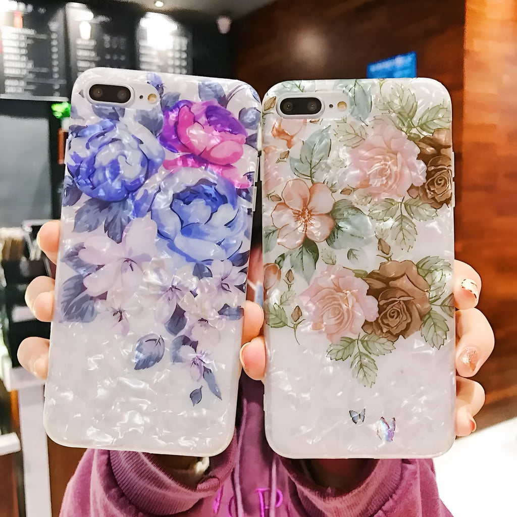 Dream Shell soft TPU silicone iPhone case with a rose flower design on the back, shown in brown colour.