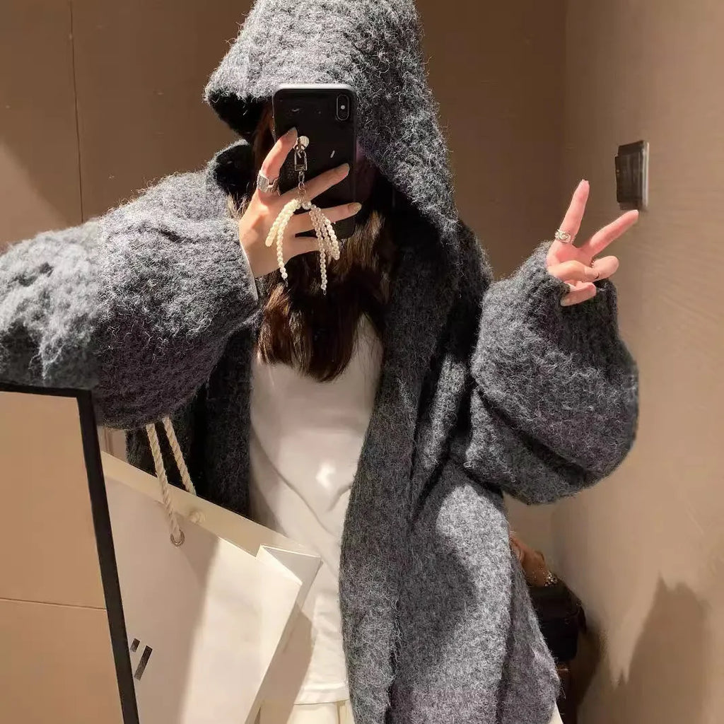 Women's retro-style thick hooded cardigan in dark grey, shown open as a sweater.