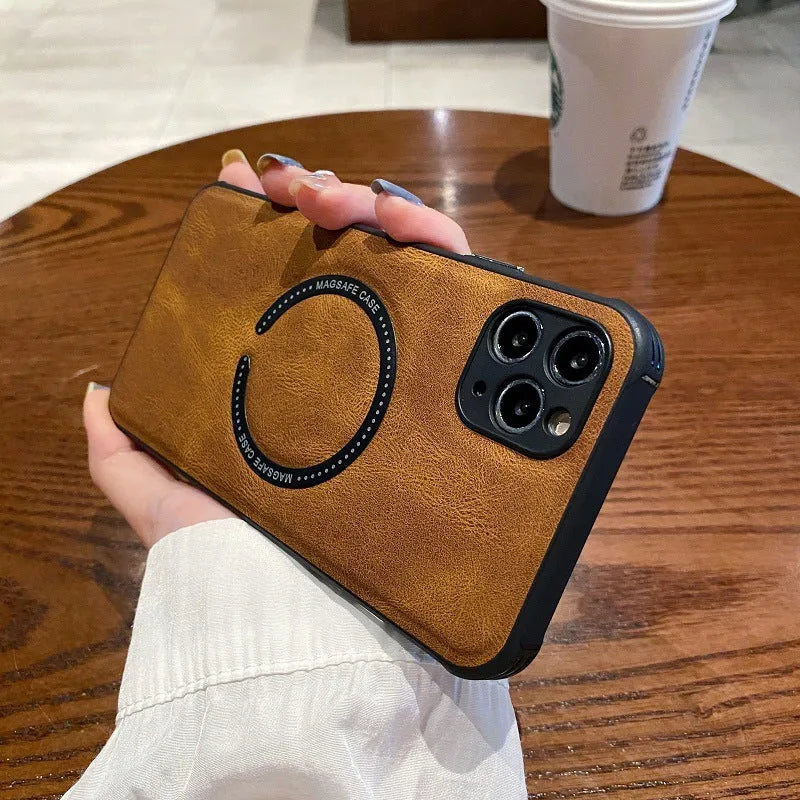 Black imitation leather magnetic charging case for iPhone on a table