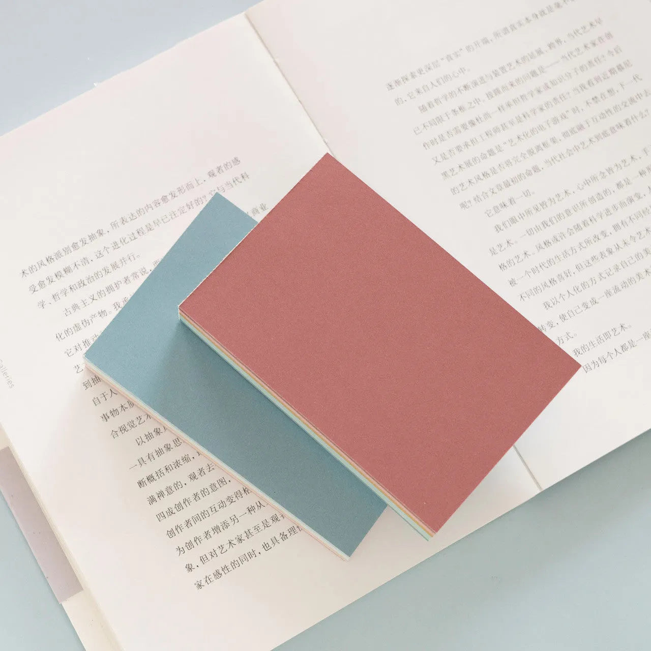 Large red and multicolour post-it notes showing 12cm by 8cm dimensions and adhesive strip