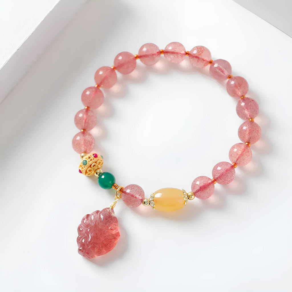 Women's strawberry quartz crystal bracelet with Nine Tail Fox beaded design