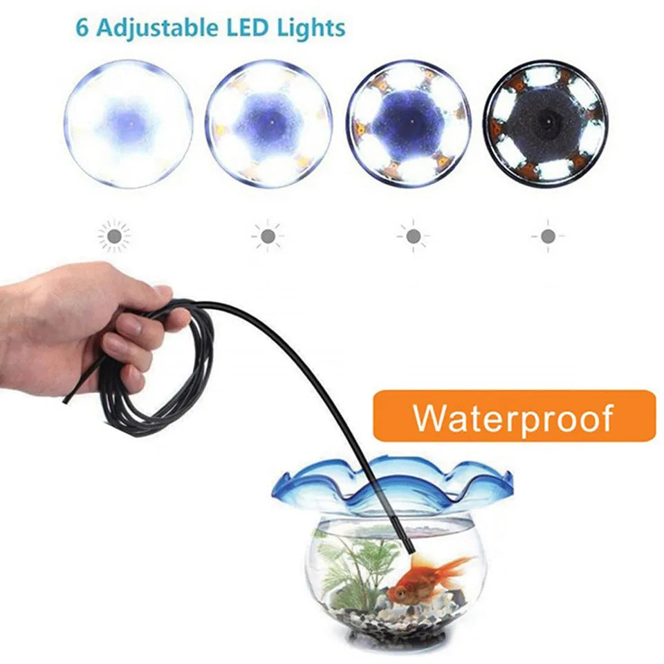 USB-C Android phone endoscope with flexible cable, side mirror, hook, and magnet attachments on a table