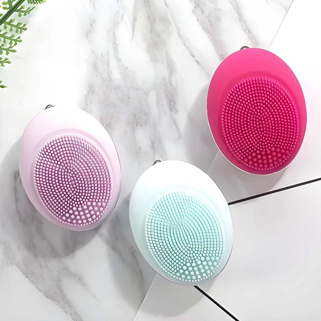 Ultrasonic electric face wash brush in pink for deep pore cleansing with vibration technology