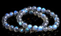 Natural cream body blue moonlight crystal bracelet with grinding finished beads on wrist