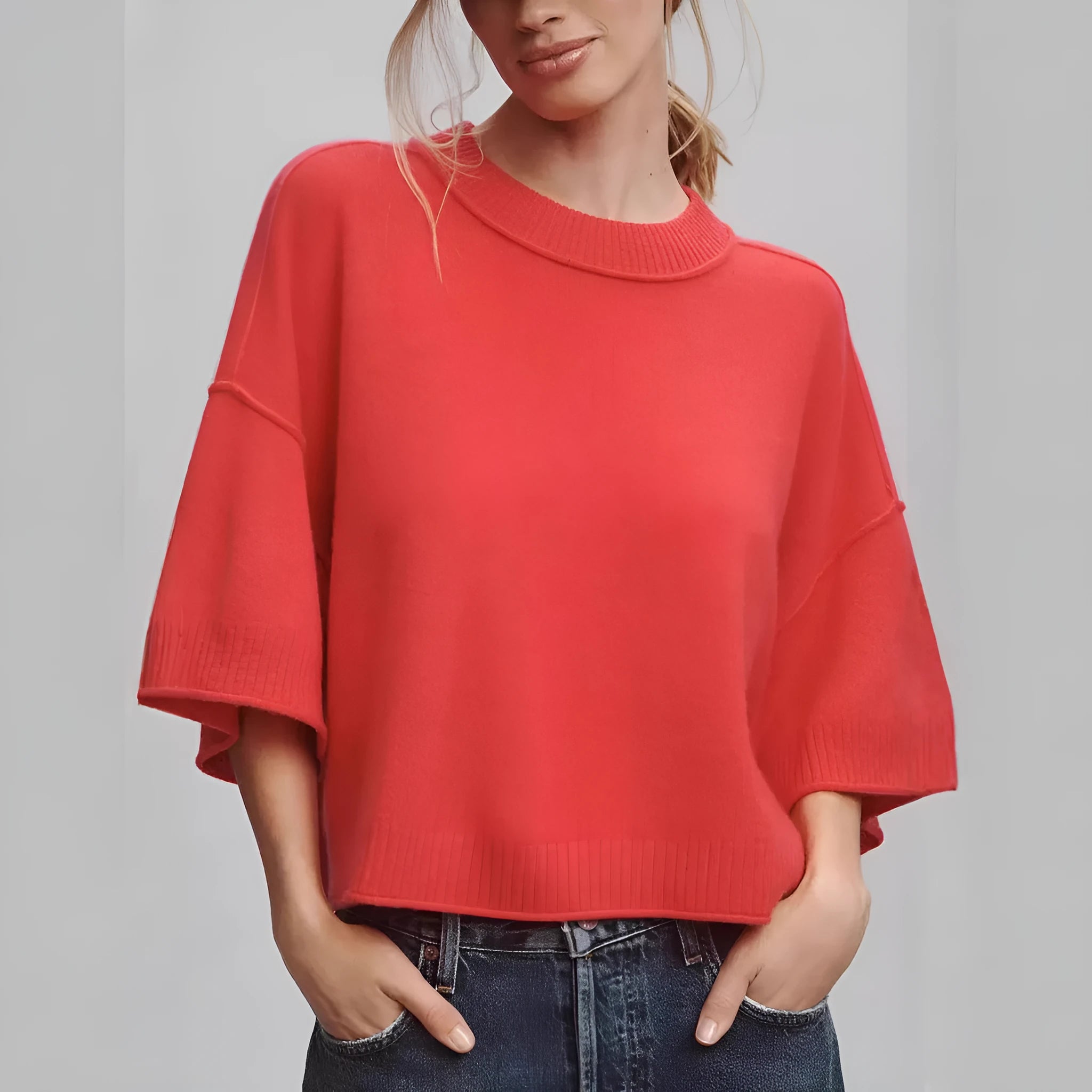 Red viscose short t-shirt with exposed navel detail on a mannequin, showing regular sleeves and pullover style.