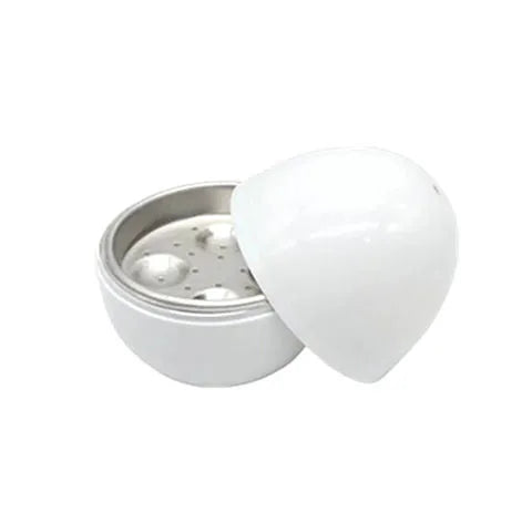 White microwave egg cooker steamer with capacity for four eggs, made from food grade plastic and aluminium.